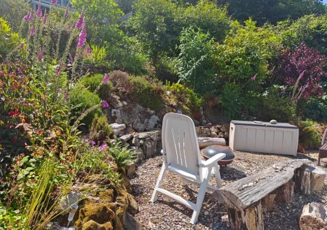 The firepit & outdoor sitting area at Sanderling House, Dale