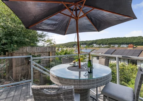 The decked terrace & alfresco dining area at Sanderling House, Dale