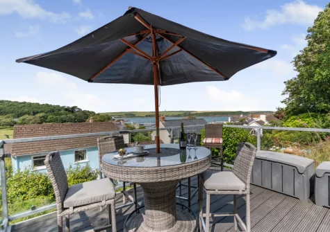 The decked terrace & alfresco dining area at Sanderling House, Dale