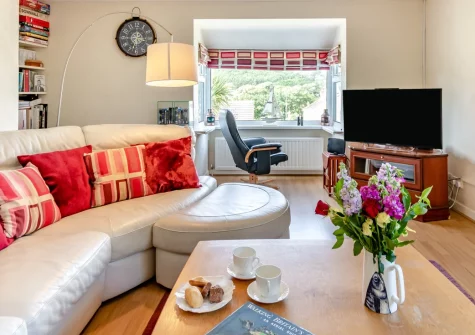 Sanderling House, Dale is a wonderfully spacious four-bedroom coastal retreat in the heart of this charming Pembrokeshire village, boasting sea views, multi-level gardens with firepit and bar area, and the beach just 150 metres away.