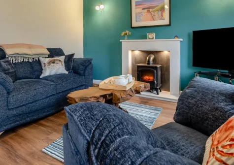 Sandy Paws, Kilgetty, is a charming pet-friendly bungalow, ideal for families seeking a Pembrokeshire escape. With a private enclosed garden, welcoming interiors, and wonderful beaches and attractions nearby, it's the perfect coastal retreat.