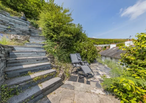 The three-level terraced garden & outdoor sitting area at Sea Thrift, Aberdovey