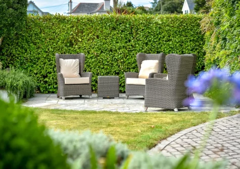 The beautifully landscaped garden & outdoor sitting area at Seabreeze, Abersoch