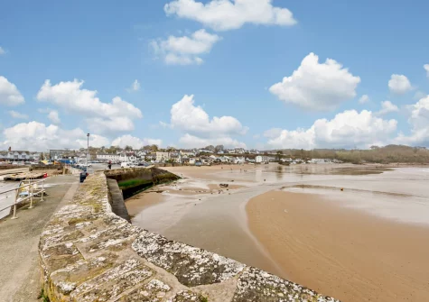 Located within the Pembrokeshire Coast National Park, Saundersfoot Beach is known for its golden sands, particularly at low tide