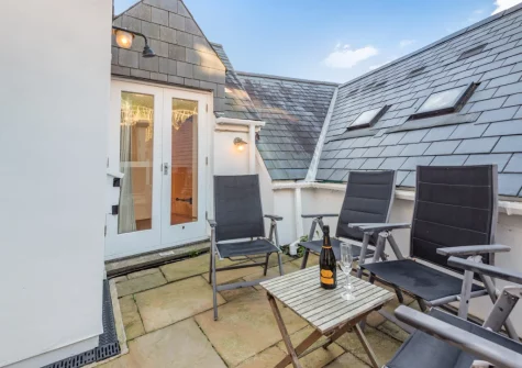 The first-floor courtyard & outdoor sitting area at Seaglass, Little Haven