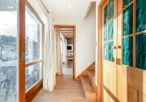 The entrance hallway & stairs up to the first floor at Seaglass, Little Haven