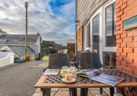 The outdoor sitting area to the front of Seaglass, Little Haven