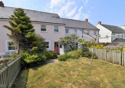 The patio, alfresco dining area & enclosed garden at Shore Break, Broad Haven