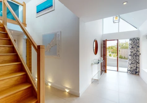 The entrance hallway & stairs up to the first floor at Skylark, Abersoch