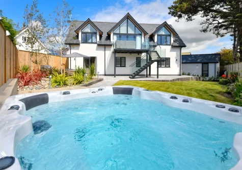 The landscaped garden & hot tub at Skylark, Abersoch