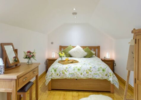 The bedroom at Snowdrop Cottage, Penfeidr Cottages, Glanrhyd