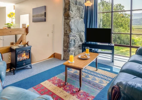 Sounds of the Brook, Llanelltyd is a charming stone cottage sat beside a babbling brook in southern Snowdonia. There is a games barn, an enclosed garden with estuary views, and it offers direct access to mountain trails and forest walks.