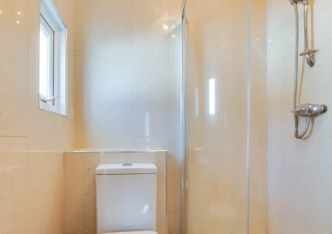 Bedroom #1 en-suite shower room at South Beach Cottage, Tenby