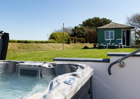 The rear garden, enclosed rear garden & summerhouse at Southwood Cottage, Newgale