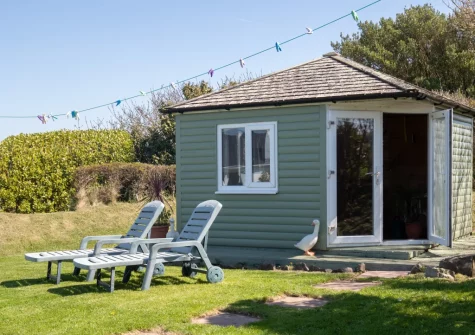The enclosed rear garden & summerhouse at Southwood Cottage, Newgale