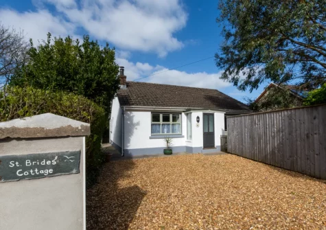 St. Brides Cottage is a charming cottage in an elevated position just a short walk from the beach & harbour