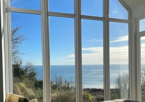 The panoramic view from the living area at Stella Maris, Freshwater East