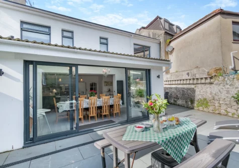 The enclosed patio garden & alfresco dining area at Stretton House, Tenby