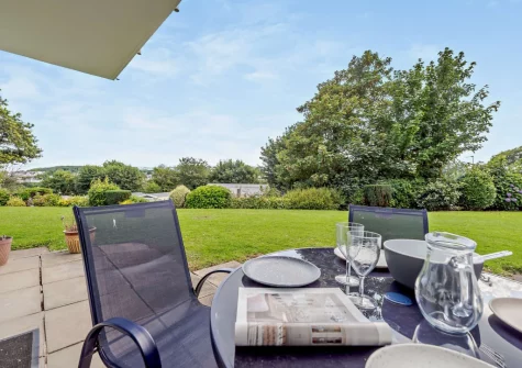 The patio, alfresco dining area & sharden garden at Summer Breeze, Saundersfoot