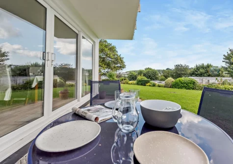 The patio, alfresco dining area & sharden garden at Summer Breeze, Saundersfoot