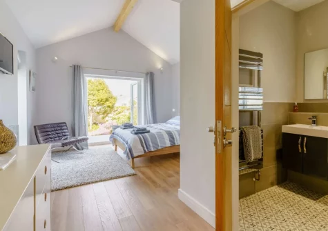 Bedroom #1 & en-suite shower room at Sundown, Saundersfoot