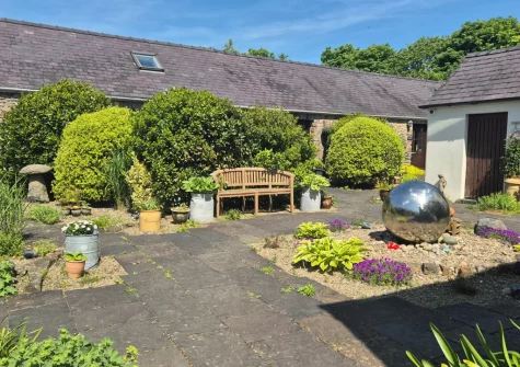The shared patio garden & outdoor sitting area at Swallow Cottage, Haverfordwest