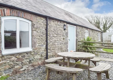 The patio & alfresco dining area at Swallow Lodge at Upper Farms Barns, Mathry