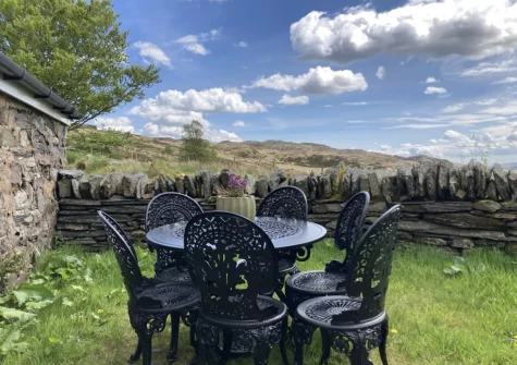 The alfresco dining area & enclosed garden at Tal-Y-Waun, Capel Curig
