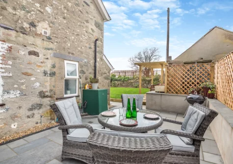 The patio, barbecue & alfresco dining area at Talafon, Pencaenewydd