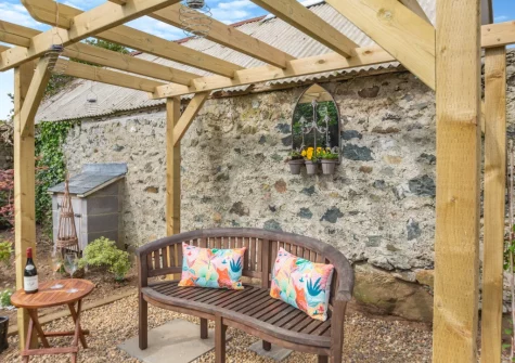The outdoor sitting area at Talafon, Pencaenewydd