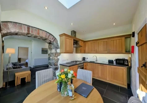 The kitchen & dining area at Tan Y Bryn Y Beudy, Cwm-Yr-Eglwys