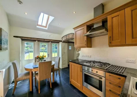 The kitchen & dining area at Tan Y Bryn Y Beudy, Cwm-Yr-Eglwys