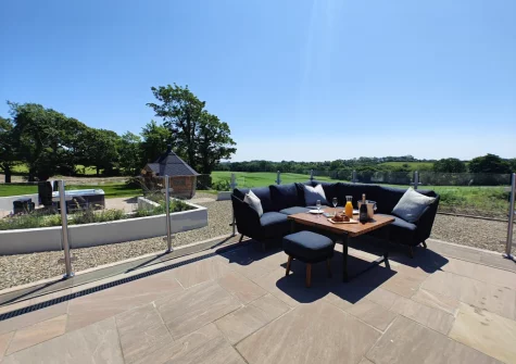 The terrace & outdoor sitting area at The Barn at Arnold's Hill Farm, Slebech