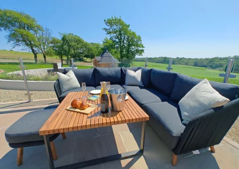 The terrace & outdoor sitting area at The Barn at Arnold's Hill Farm, Slebech