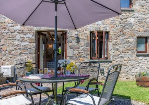 The patio, alfresco dining area & garden at The Barn, Haverfordwest