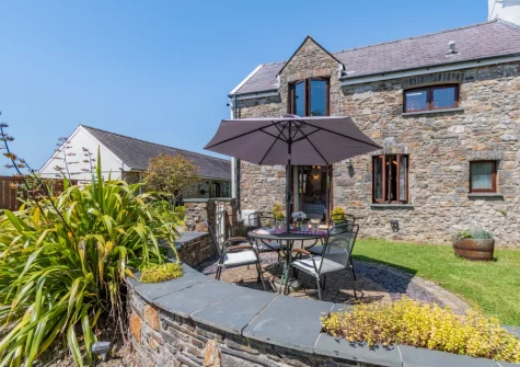 The patio, alfresco dining area & garden at The Barn, Haverfordwest