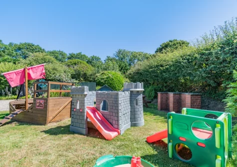 The shared children's play area at The Barn, Haverfordwest