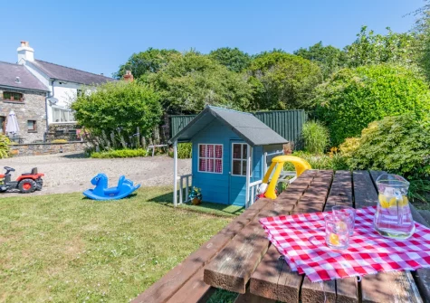 The shared children's play & alfresco dining area at The Barn, Haverfordwest