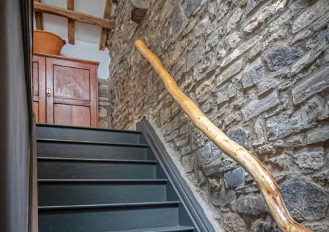 The stairs up to the first floor at The Barn, Llanddewi Velfrey
