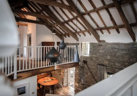 Ancient rustic features with contemporary ultra-modern styling creates a totally unique, worldly interior that is respectful of the provenance of this historic building