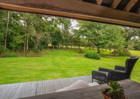 The decked patio & outdoor sitting area at The Barn, Llanddewi Velfrey
