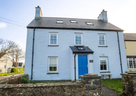 The Croft is a cosy coastal escape with sea views, a warming wood burner & enclosed garden