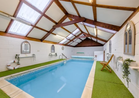 The shared indoor swimming pool at The Granary, St Florence