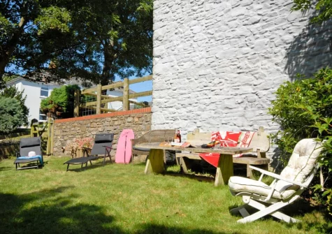 The garden & outdoor sitting area at The Hayloft, Broad Haven