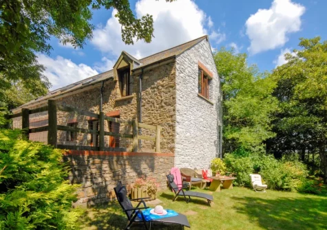 The garden & outdoor sitting area at The Hayloft, Broad Haven