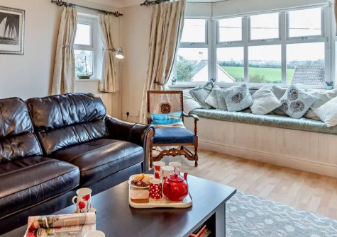 The Lavenders, Penally is a charming four-bedroom home sleeping eight guests, perfectly positioned for beach access and coastal exploration. Enjoy countryside views, family-friendly amenities, games room, and memorable Welsh seaside holidays.