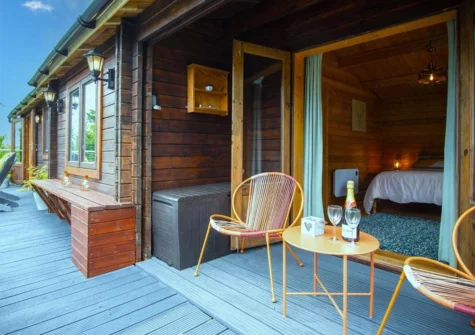 The decked patio at The Lodge At Sheepswalk Farm, Amroth