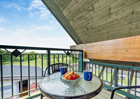 The balcony & outdoor sitting area at The Loft, Trefloyne Manor, Penally