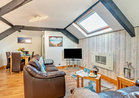 The living & dining area at The Mews, Tenby