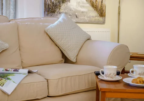 The living room at The Old Coach House, Tenby